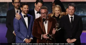 # Apple's The Studio Sets Emmy Record with 13 Wins Including Best Comedy Series Seth Rogen's Hollywood satire The Studio made Emmy awards history with a record breaking win streak. The Apple TV+ comedy series won 13 Emmy awards this year. This is the most wins for any comedy series in a single season. The show won four Primetime Emmy awards on Sunday night including the top prize for Outstanding Comedy Series. The Studio also broke the record for most wins by a first year comedy series. It had already received nine Creative Arts Emmy awards before Sunday's ceremony. The show earned 23 nominations which tied the record set by The Bear last year. This incredible success marks a major milestone for Apple's streaming service. ## Outstanding Comedy Series Victory The Studio won the Emmy for Outstanding Comedy Series at the 77th Primetime Emmy Awards. The show competed against strong contenders including Abbott Elementary, The Bear, and Hacks. This victory completed an extraordinary awards journey for the freshman series that premiered just six months ago. Seth Rogen accepted the award with his team of collaborators. He appeared genuinely surprised by the win despite the show's earlier successes during the evening. Rogen thanked everyone who watched and appreciated the show during his acceptance speech. > "Thank you. It's getting embarrassing. I really appreciate it," Rogen said at the beginning of his speech. "In all honesty — I'll do my best attempt at sincerity here — if you watched our show, if you appreciated our show, if you voted for our show especially, thank you very much." The win was particularly significant for co-creator Frida Perez. She became the first Latina ever to win the Outstanding Comedy Series award. The production team also included Evan Goldberg, Peter Huyck, and Alex Gregory. ## Seth Rogen Wins Best Actor Seth Rogen won the Emmy for Outstanding Lead Actor in a Comedy Series for his role as Matt Remick. He plays a newly appointed studio head struggling with corporate demands and creative ideals. This was Rogen's first Emmy award for acting though he has been nominated before for producing. Rogen defeated strong competition from Jeremy Allen White of The Bear and Martin Short from Only Murders in the Building. His win was part of The Studio's overall dominance in the comedy categories during the ceremony. Rogen personally contributed to multiple award wins throughout the night. The actor expressed genuine emotion about receiving the recognition. He acknowledged feeling somewhat embarrassed by how happy the award made him. Rogen also took time to thank the people he worked with on the series. > "I'm legitimately embarrassed by how happy this makes me," Rogen admitted during his acceptance speech. "To be standing up here with all these people, these are the best people I know. And to have them spend their days working with me is truly one of the great honors of my life." ## Writing and Directing Awards The creative team behind The Studio won awards for both writing and directing. Seth Rogen and Evan Goldberg won the Emmy for Outstanding Directing for a Comedy Series. They won for directing the episode titled "The Oner" which showcased their filmmaking skills. The writing team earned the Emmy for Outstanding Writing for a Comedy Series. The winning writers included Seth Rogen, Evan Goldberg, Peter Huyck, Alex Gregory, and Frida Perez. This recognition highlighted the sharp comedy and storytelling that defined the show's successful first season. These wins demonstrated the series excellence behind the camera as well as in front of it. The awards recognized the technical and creative craftsmanship that contributed to the show's critical success. The Studio beat tough competition from established favorites in both categories. ## Creative Arts Emmy Wins Before Sunday's Primetime ceremony, The Studio had already won nine Creative Arts Emmy awards. These awards recognized the technical excellence and supporting performances in the series. The wins covered various aspects of production from technical achievements to guest performances. Bryan Cranston won Outstanding Guest Actor in a Comedy Series for his appearance on the show. The series also won for Outstanding Production Design, Outstanding Casting, and Outstanding Cinematography. Additional awards recognized the show's costume design, editing, music supervision, and sound work. The complete list of Creative Arts Emmy wins for The Studio includes Outstanding Guest Actor, Outstanding Production Design, Outstanding Casting, Outstanding Cinematography, Outstanding Contemporary Costumes, Outstanding Picture Editing, Outstanding Music Supervision, Outstanding Sound Editing, and Outstanding Sound Mixing. These awards demonstrated the show's all around excellence in production quality. ## Record Breaking Achievements The Studio set multiple records with its 13 Emmy wins this year. The show now holds the record for most wins by a comedy series in a single season. It broke the previous record of 11 wins set by The Bear just last year. The series also became the most winning freshman comedy in Emmy history. It surpassed the previous record held by other acclaimed first year comedies. The show's 23 nominations tied the record for most nominations for a comedy series set by The Bear in 2024. Seth Rogen personally tied the record for most Emmys won by a single individual in one night. He joined an elite group that includes Moira Demos, Amy Sherman Palladino, and Dan Levy. Rogen contributed to wins in acting, writing, and directing categories. ## Show Description and Background The Studio is a workplace comedy that satirizes modern Hollywood. Seth Rogen stars as Matt Remick, who becomes head of Continental Studios. The character struggles to balance corporate demands with his genuine love for movies. The show explores the challenges of managing creative talent while answering to corporate overlords. The supporting cast includes Catherine O'Hara, Ike Barinholtz, Chase Sui Wonders, and Kathryn Hahn. The series features numerous A list guest appearances throughout its first season. The show was created and executive produced by Rogen, Evan Goldberg, Peter Huyck, Alex Gregory, and Frida Perez. The series had a multi episode premiere in March 2025 on Apple TV+. It was renewed for a second season in May after positive critical reception and strong viewer response. The show has become part of the cultural conversation about Hollywood's internal workings. ## Apple TV+'s Emmy Success Apple TV+ had a remarkable night at the Emmy awards beyond just The Studio's success. The streaming service won 22 Emmy awards overall across its original programming. Severance won eight awards including Outstanding Lead Actress for Britt Lower and Outstanding Supporting Actor for Tramell Tillman. Slow Horses won Outstanding Directing for a Drama Series for Adam Randall's work. This continued success demonstrates Apple's growing influence in the premium television space. The service has now earned 620 wins and 2,816 award nominations for its original content. Apple executives expressed pride in their creative teams' accomplishments. Zack Van Amburg, Apple's head of Worldwide Video, called it an "unforgettable, record setting night." Jamie Erlicht, also head of Worldwide Video, said the wins show "how great stories connect with audiences everywhere." ## Other Major Emmy Winners While The Studio dominated the comedy categories, other shows also earned major awards. The Pitt won Outstanding Drama Series and Noah Wyle won Lead Actor in a Drama for the same show. Adolescence won Outstanding Limited or Anthology Series and earned several acting awards. Jean Smart won her fourth Emmy for Lead Actress in a Comedy Series for Hacks. Hannah Einbinder won Supporting Actress in a Comedy for the same show. The Late Show with Stephen Colbert won Outstanding Talk Series for the first time. The Traitors won Outstanding Reality Competition Program. The Emmy ceremony was hosted by comedian Nate Bargatze. He implemented a unique system to keep acceptance speeches brief by tying them to charity donations. The Studio's unprecedented success at the 2025 Emmy awards represents a significant achievement for Apple TV+ and the creative team behind the series. The show's record breaking 13 wins demonstrate excellence across all aspects of television production from acting and writing to technical craftsmanship. **Also Read:** Credits: Deadline, Apple Newsroom, Variety Tags: The Studio, Seth Rogen, Emmy Awards 2025, Apple TV+, Comedy Series Meta Description: Seth Rogen's The Studio made Emmy history with 13 wins including Best Comedy Series, breaking records for most wins by a comedy series in a single season. Focus Keywords: The Studio Emmy wins, Seth Rogen Emmy, Apple TV+ comedy series, Outstanding Comedy Series 2025, most Emmy wins comedy series
