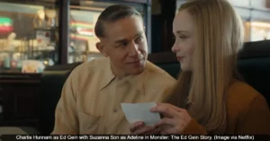 Charlie Hunnam as Ed Gein with Suzanna Son as Adeline in Monster: The Ed Gein Story.