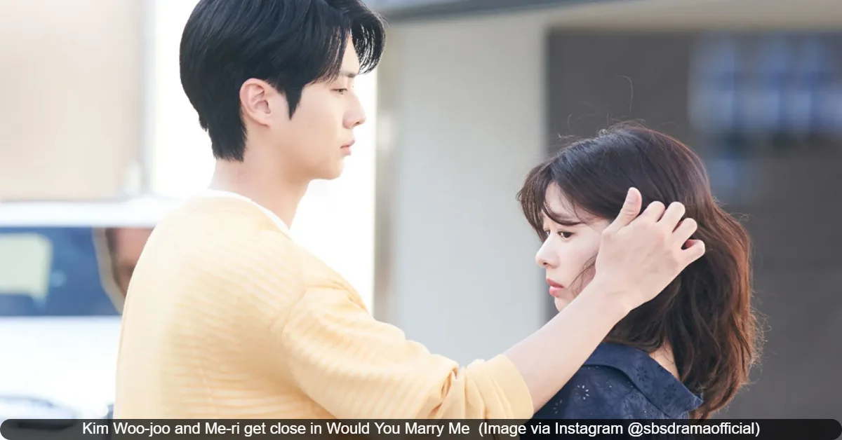 Kim Woo joo and Me ri get close in Would You Marry Me Image via Instagram @sbsdramaofficial Would You Marry Me