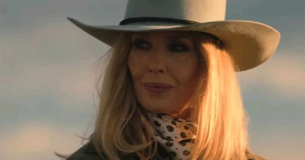 # Dutton Ranch Premiere Recap: Fire Destroys Montana Home, A Hidden Corpse in Texas, and a Dangerous Teen Romance The new **Yellowstone** spin-off, **Dutton Ranch**, arrived on **Paramount+ on May 15, 2026**, with two explosive episodes that immediately throw **Beth Dutton** and **Rip Wheeler** into a new kind of hell. After losing almost everything in a devastating wildfire, the couple moves to **Rio Paloma, Texas**, hoping for peace. Instead, they find a hidden dead body, a powerful new enemy named **Beulah Jackson**, and a brewing war over land and power. The premiere delivers the same gritty drama fans love, proving that trouble follows the Duttons wherever they go. ## A Wildfire Forces Beth and Rip to Start Over in Texas **Dutton Ranch** picks up one year after the end of **Yellowstone** Season 5. **Beth** and **Rip** left Montana to build a quiet life on a small ranch in the mountains with their adopted son, **Carter**. But their dream does not last long. A massive wildfire rips through their property in **Dillon, Montana**, burning their home to the ground. **Rip** nearly dies saving a calf from the flames. **Beth** finds him half-burned but alive, and the family escapes with only a few horses, some cattle, and basically nothing else. Six months later, they settle in the fictional Texas town of **Rio Paloma**. They use their remaining savings to buy the **Edwards Ranch**, a 5,000-acre property that costs them almost every penny they have. The previous owner, **Jeanie Edwards**, sells it to them only because she trusts a **Dutton** to protect the soul of the land. **Rip** renames it **Dutton Ranch**. ## A Murder on the Ranch Nobody Is Talking About The biggest shock of the premiere happens before **Beth** and **Rip** even sign the paperwork. A violent cowboy named **Rob-Will Jackson** discovers that a worker named **Wes** has been looking at the ranch’s tally books and asking questions. **Rob-Will** gets paranoid that **Wes** will expose his drug theft. He drags **Wes** outside in the middle of the night and shoots him in the head in front of another worker named **Chet**. **Rob-Will** buries the body on a piece of land that soon becomes the **Dutton Ranch** property. **Rip** finds the corpse when he hears hogs squealing and sees vultures circling over disturbed dirt. Instead of calling the local sheriff, **Rip** makes a dangerous choice. He digs up the body in the middle of the night, hides it in a freezer in his barn, and later dumps it down an abandoned **Goliad mine shaft**. **Cole Hauser**, who plays **Rip**, explained why his character keeps the murder a secret from **Beth**. He told Radio Times that **Rip** only wants to protect her from more stress. > “I kinda like it when he pokes her. But that secret is to protect **Beth** and to protect her peace. He didn’t want her to worry. He wanted her to enjoy the peace and the silence and the difference to what she experienced up in Montana.” **Hauser** admitted he initially had issues with the storyline but understood after talking with showrunner **Chad Feehan**. “It’s not a lie, it’s more **Rip** caring for her,” he said. But **Beth** has already noticed him leaving their bed in the middle of the night, and this secret could destroy their trust. ## Meet Beulah Jackson, the Duttons’ Most Dangerous Enemy Yet The new villain of **Dutton Ranch** is **Beulah Jackson**, played by the legendary **Annette Bening**. She runs the massive **10 Petal Ranch**, which dominates the local cattle market. **Beulah** wanted to buy the **Edwards Ranch** for years, so **Beth** outbidding her creates an instant and powerful enemy. **Beulah** is calm, calculated, and controls almost everything in **Rio Paloma**. She refuses to let the Duttons use her slaughterhouse and demands a cut of their profits instead. **Beth** calls her an extortionist and walks out, officially starting a war. **Beulah** does not just control the business. She also controls the crime. After **Rob-Will** commits murder, she orders her eldest son, **Joaquin**, to clean up the mess. When the body goes missing, she sends **Rob-Will** to a rehabilitation facility in **Sedona**—for the third time. She blackmails **Chet** into becoming the new foreman and forces him to beat up another worker who asks too many questions. **Jai Courtney** plays **Rob-Will Jackson**, the volatile and drug-addicted grandson who committed the murder. **Juan Pablo Raba** plays **Joaquin**, the calm fixer who wears suits and handles the family’s dirty business. **Raba** told Page Six that working with **Bening** was like going to acting school every day. ## Carter’s Romance with the Enemy’s Daughter Creates a Major Problem While **Rip** hides a dead body, **Carter** faces a different kind of trouble. Now a teenager played by **Finn Little**, **Carter** struggles to fit in at a new school in Texas. He goes to a local rodeo and sees a girl named **Oreana** fighting with her boyfriend. When the boyfriend gets physical, **Carter** punches him and ends up arrested. **Oreana**, played by **Natalie Alyn Lind**, bails **Carter** out of jail. The two grow close quickly. She is rebellious, comes from money, and convinces **Carter** to skip school and drink beer with him. For the first time, **Carter** feels like someone understands him. But the romance takes a dark turn in the final moments of Episode 2. Viewers learn that **Oreana** is actually **Rob-Will’s** daughter and **Beulah Jackson’s** granddaughter. The girl **Carter** is falling for comes from the family already at war with **Beth** and **Rip**. If the Jacksons learn about this relationship, **Carter** becomes a weakness they can easily exploit. ## Beth Finds an Ally in a Local Veterinarian **Ed Harris** joins the cast as **Everett McKinney**, a retired Navy veteran turned local veterinarian. **Beth** meets him when she pays to save an injured mare that everyone else wanted to put down. **Everett** respects her determination, and the two quickly form a friendship. **Everett** helps **Beth** find an independent slaughterhouse outside the Jackson family’s control. He also provides a friendly face in a town full of enemies. In Episode 2, **Everett** plays country songs on stage at a local bar while **Beth** and **Rip** dance together. His calm and funny energy brings a lighter touch to the otherwise dark drama. **Marc Menchaca** also appears as **Zachariah**, a cowboy with a criminal past who **Rip** hires as a ranch hand. **Menchaca** told Page Six that working with **Hauser** was great because **Hauser** is so knowledgeable about the world and serves as an executive producer on the show. ## Wes’ Wife Files a Missing Person Report, Putting Everyone at Risk Back in town, **Whitney Ayers**, **Wes’** wife, grows worried when her husband does not return home for three days. She knows **Wes** would never abandon their young son, **Colt**. She storms into the local police station and forces **Sheriff Wade** to file a missing person report. **Joaquin** tries to bribe **Whitney** with an envelope full of cash, telling her that **Wes** ran off with a hooker. **Whitney** refuses to believe him. She becomes convinced the Jacksons had something to do with the disappearance and starts packing up to leave town for her son’s safety. If the sheriff’s department starts searching for **Wes**, they may eventually find the abandoned mine where **Rip** hid the body. If the corpse is discovered with **Rip’s** fingerprints on it, all eyes will turn to the Duttons. The first two episodes of **Dutton Ranch** set up a season full of secrets, violence, and family loyalty. **Rip** carries the weight of a murder he did not commit. **Carter** unknowingly dates the enemy’s daughter. And **Beth** continues to poke at **Beulah Jackson**, unaware that the Jackson family already has a reason to destroy her. With seven episodes remaining, the tension is only just beginning. **Also Read:** **Dutton Ranch** Cast Salary Revealed: How Much Kelly Reilly and Cole Hauser Earn for the Yellowstone Spin-Off For more updates on the **Yellowstone** universe and exclusive **Dutton Ranch** coverage, keep reading VvipTimes for breaking news and recaps. --- **Meta Title:** Dutton Ranch Premiere Recap: Fire, Death and Texas Drama **Meta Description:** Dutton Ranch episodes 1 and 2 recap. A wildfire destroys Beth and Rip’s Montana home. A hidden corpse in Texas. Carter’s risky new romance with the enemy’s daughter. **Permalink:** dutton-ranch-premiere-recap-fire-death-texas-drama **Focus Keywords:** Dutton Ranch premiere recap, Beth and Rip Texas move explained, Dutton Ranch dead body secret, Dutton Ranch Carter romance, Dutton Ranch Beulah Jackson villain **Hashtags:** #DUTTONRANCH #KELLYREILLY #COLEHAUSER #FINNLITTLE #PARAMOUNTPLUS **Tags:** DUTTON RANCH, YELLOWSTONE SPINOFF, KELLY REILLY, COLE HAUSER, FINN LITTLE, ANNETTE BENING, ED HARRIS, JAI COURTNEY, PARAMOUNT PLUS, TV SERIES, WESTERN SERIES