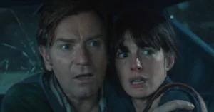 The End of Oak Street Trailer Drops Dinosaur Surprise: Anne Hathaway and Ewan McGregor Fight For Survival After Suburb Time Travels Back to Prehistoric Era