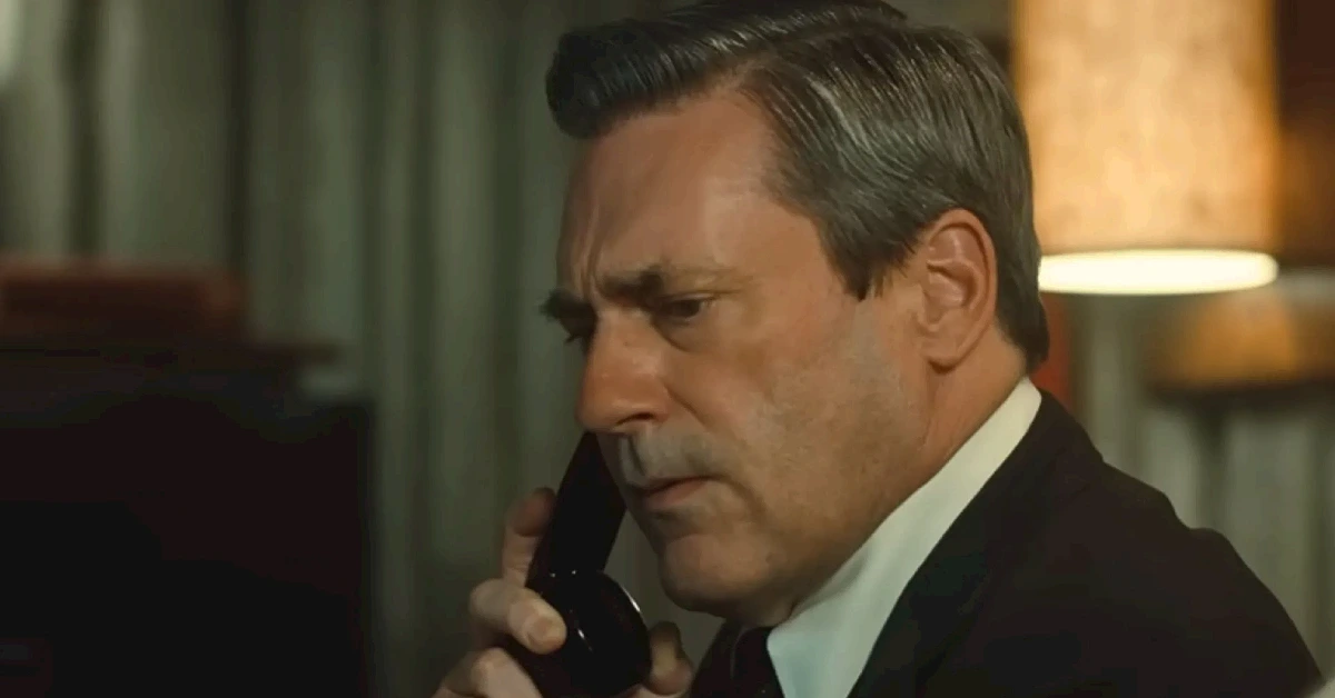 American Hostage Premiere Shows How Jon Hamm’s Character Fred Gets Pulled Into Bizarre Hostage Crisis
